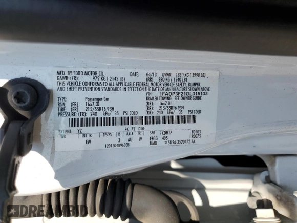 2013 Ford Focus SE with VIN 1FADP3F21DL315133, listed as a Copart auction lot 60502705 with 123,504 mi miles and Salvage title. Bid and sale history available at DreamBid. Image 12.