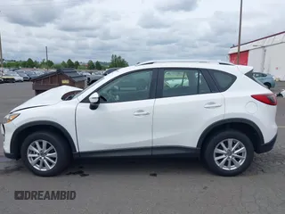 2016 Mazda CX-5 Sport with VIN JM3KE4BY7G0764563, listed as a IAAI auction lot 42279993 with 128,950 mi miles and . Bid and sale history available at DreamBid. Image 14.