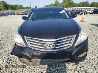 2013 Hyundai Azera с VIN KMHFH4JG2DA266282, выставлен на аукционе Copart как лот 59156175 с пробегом 135 013 миль миль и Списание • Salvage title. История ставок и продаж доступна на DreamBid. Изображение 5.