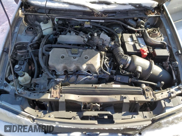 2001 Ford Escort Fleet z VIN 3FAFP13P91R211189, wystawiony jako Copart lot #88252295 z przebiegiem 71 605 mil mil oraz Szkoda całkowita • Salvage title. Historia ofert i sprzedaży dostępna na DreamBid. Obrazek 11.