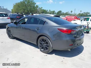 2014 Mazda Mazda6 i Touring with VIN JM1GJ1V69E1146705, listed as a IAAI auction lot 42022033 with 123,239 mi miles. Bid and sale history available at carsss.com. Image 3.