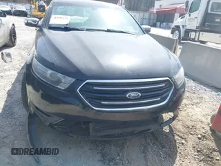 2014 Ford Taurus Limited with VIN 1FAHP2F80EG105147, listed as a IAAI auction lot 41899174 with 137,451 mi miles and . Bid and sale history available at DreamBid. Image 6.