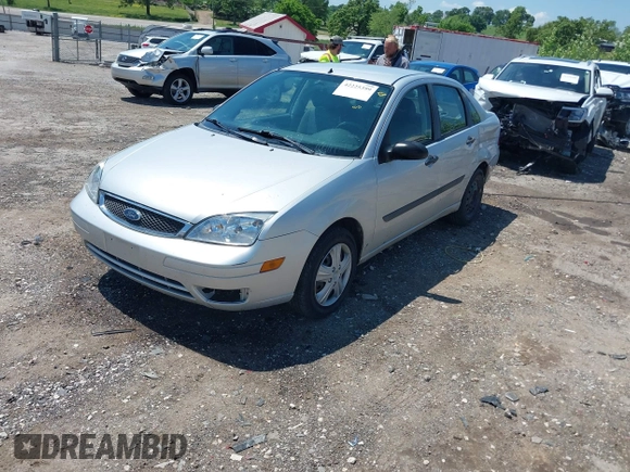 2007 Ford Focus S z VIN 1FAFP34N57W109953, wystawiony jako IAAI lot #42225399 z przebiegiem Nie podano mil oraz . Historia ofert i sprzedaży dostępna na DreamBid. Obrazek 2.