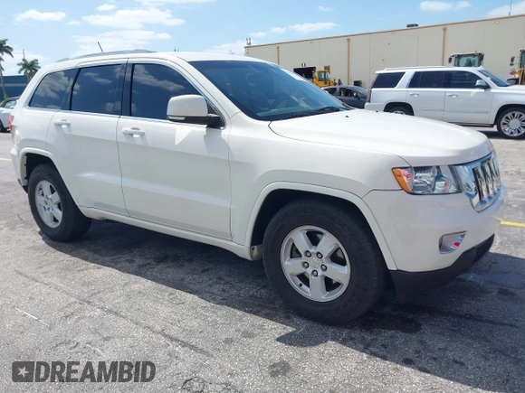 2011 Jeep Grand Cherokee Laredo with VIN 1J4RS4GG0BC573388, listed as a IAAI auction lot 42167064 with 63,363 mi miles and . Bid and sale history available at DreamBid. Image 1.