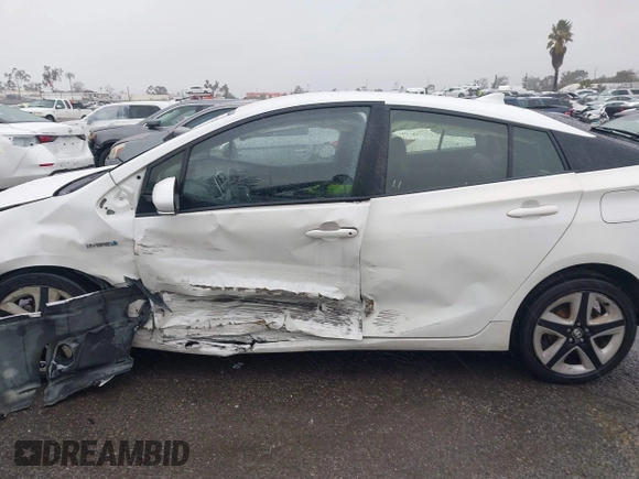 2016 Toyota Prius Four z VIN JTDKARFU5G3018930, wystawiony jako IAAI lot #41570722 z przebiegiem 172 791 mil mil oraz . Historia ofert i sprzedaży dostępna na DreamBid. Obrazek 13.