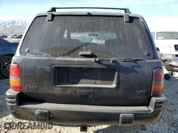 1997 Jeep Grand Cherokee Limited with VIN 1J4GZ78Y1VC563890, listed as a Copart auction lot 41910925 with 0 mi miles and Clean Title. Bid and sale history available at carsss.com. Image 6.