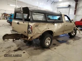 1999 Ford F-150 z VIN 1FTRF18W5XKB44503, wystawiony jako Copart lot #82359574 z przebiegiem 272 265 mil mil oraz Szkoda całkowita • Salvage title. Historia ofert i sprzedaży dostępna na DreamBid. Obrazek 3.