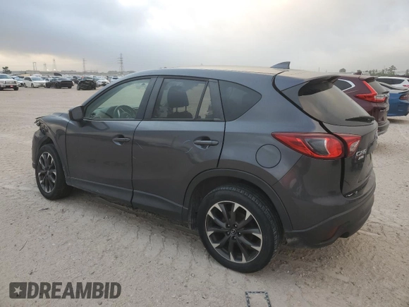 2016 Mazda CX-5 Grand Touring with VIN JM3KE4DY5G0865923, listed as a Copart auction lot 51637115 with 151,174 mi miles and Salvage Title. Bid and sale history available at carsss.com. Image 2.