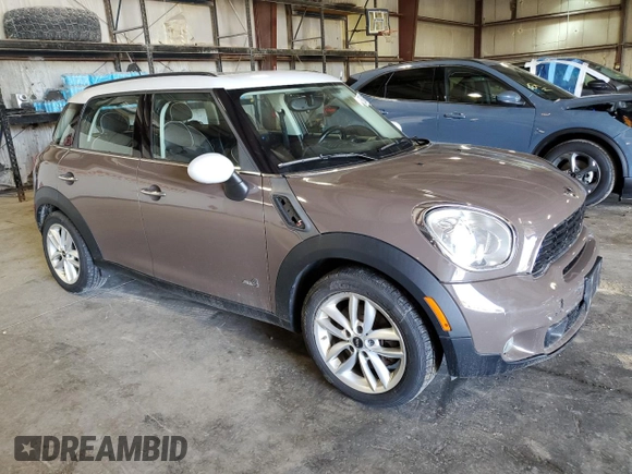 2012 MINI Countryman S with VIN WMWZC5C56CWL61976, listed as a Copart auction lot 62948195 with 122,507 mi miles and Clean title. Bid and sale history available at DreamBid. Image 4.
