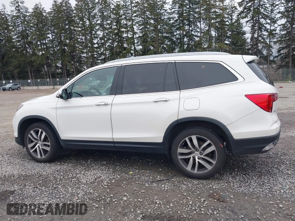 2017 Honda Pilot Elite with VIN 5FNYF6H06HB096156, listed as a IAAI auction lot 41771161 with 73,889 mi miles and . Bid and sale history available at DreamBid. Image 14.