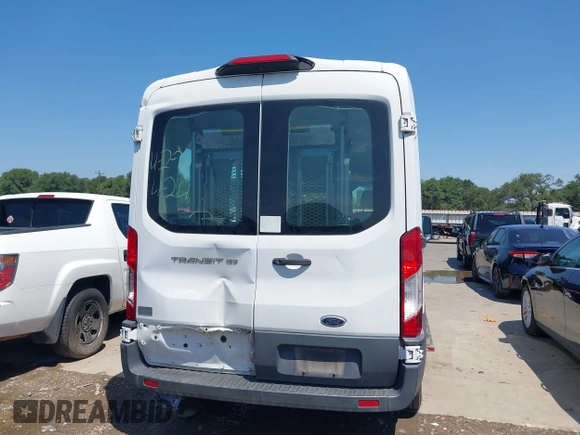 2018 Ford Transit XL z VIN 1FMZK1CM5JKB31481, wystawiony jako IAAI lot #42329280 z przebiegiem 57 051 mil mil oraz . Historia ofert i sprzedaży dostępna na DreamBid. Obrazek 16.