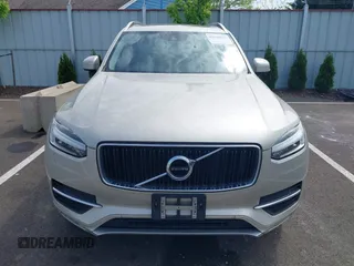 2016 Volvo XC90 T6 Momentum with VIN YV4A22PK7G1038750, listed as a IAAI auction lot 42128057 with 124,112 mi miles. Bid and sale history available at carsss.com. Image 6.
