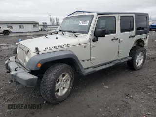 2007 Jeep Wrangler Unlimited Rubicon with VIN 1J8GA691X7L191115, listed as a Copart auction lot 87523925 with 85,709 mi miles and Salvage title. Bid and sale history available at DreamBid. Image 1.