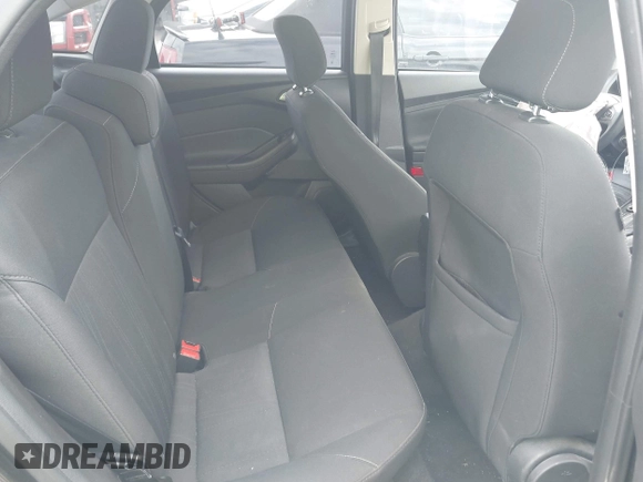 2018 Ford Focus SE with VIN 1FADP3F22JL295342, listed as a IAAI auction lot 42335881 with 77,464 mi miles and . Bid and sale history available at DreamBid. Image 8.