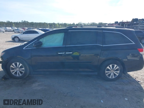 2015 Honda Odyssey EX-L with VIN 5FNRL5H65FB088106, listed as a IAAI auction lot 41880915 with 176,539 mi miles and . Bid and sale history available at carsss.com. Image 14.