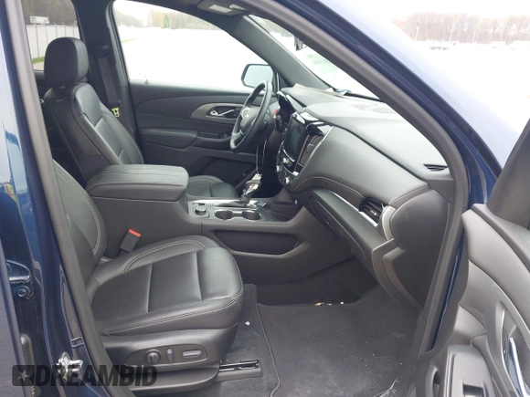 2023 Chevrolet Traverse LT z VIN 1GNEVHKW0PJ120044, wystawiony jako IAAI lot #42002348 z przebiegiem 48 795 mil mil oraz . Historia ofert i sprzedaży dostępna na DreamBid. Obrazek 5.