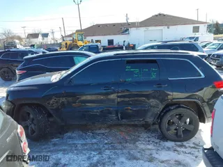 2015 Jeep Grand Cherokee Altitude with VIN 1C4RJFAG6FC724592, listed as a IAAI auction lot 41525448 with 173,306 mi miles. Bid and sale history available at carsss.com. Image 14.