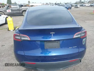 2021 Tesla Model Y Long Range with VIN 5YJYGAEE5MF199286, listed as a IAAI auction lot 41677915 with 52,500 mi miles. Bid and sale history available at carsss.com. Image 17.