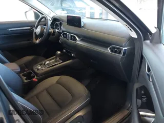 2024 Mazda CX-5 2.5 S Preferred Package with VIN JM3KFBCL1R0428883, listed as a IAAI auction lot 41755898 with 7,386 mi miles. Bid and sale history available at carsss.com. Image 5.