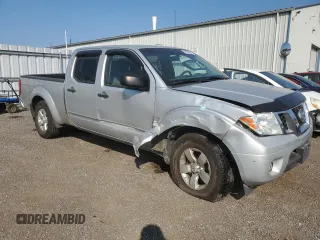 2013 Nissan Frontier SV with VIN 1N6AD0FVXDN715000, listed as a Copart auction lot 69560064 with 238,973 mi miles and Clean title. Bid and sale history available at DreamBid. Image 4.