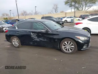 2015 Infiniti Q50 Premium with VIN JN1BV7AP9FM342033, listed as a IAAI auction lot 41241687 with 183,887 mi miles and . Bid and sale history available at DreamBid. Image 14.