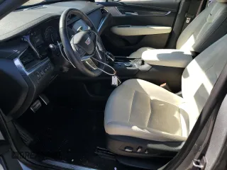 2023 Cadillac XT5 AWD Sport with VIN 1GYKNGRS7PZ133622, listed as a Copart auction lot 48342095 with 63,008 mi miles and Salvage title. Bid and sale history available at DreamBid. Image 7.