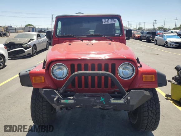 2004 Jeep Wrangler Sport with VIN 1J4FA49S24P720488, listed as a Copart auction lot 60331795 with 134,974 mi miles and Salvage title. Bid and sale history available at DreamBid. Image 5.