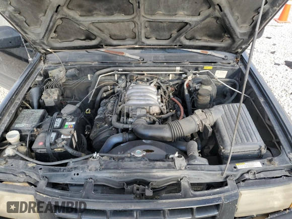 1999 Isuzu Rodeo S with VIN 4S2CK58W3X4362974, listed as a Copart auction lot 43155155 with 396,448 mi miles and Salvage Title. Bid and sale history available at DreamBid. Image 14.