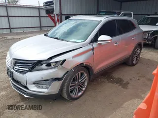 2015 Lincoln MKC with VIN 5LMTJ2AH8FUJ23341, listed as a IAAI auction lot 41828159 with 103,562 mi miles. Bid and sale history available at carsss.com. Image 2.