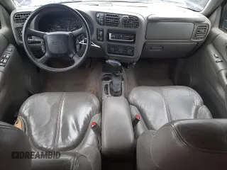 1999 GMC Jimmy SLE with VIN 1GKDT13W1X2551085, listed as a Copart auction lot 50553055 with 189,974 mi miles and Salvage Title. Bid and sale history available at carsss.com. Image 8.