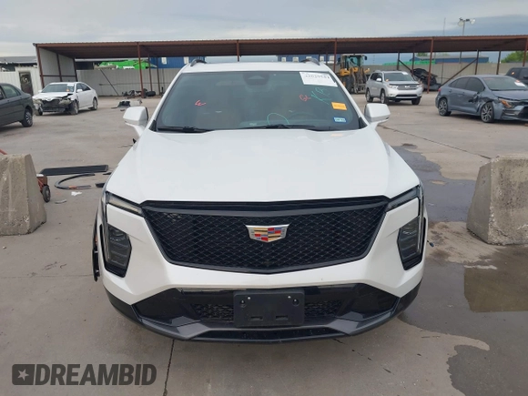 2024 Cadillac XT4 FWD Sport with VIN 1GYFZER42RF246488, listed as a IAAI auction lot 42029551 with 6,476 mi miles and . Bid and sale history available at DreamBid. Image 13.