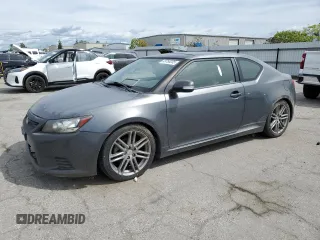 2013 Scion tC with VIN JTKJF5C72D3053434, listed as a Copart auction lot 49758205 with 135,911 mi miles and Clean Title. Bid and sale history available at carsss.com. Image 1.