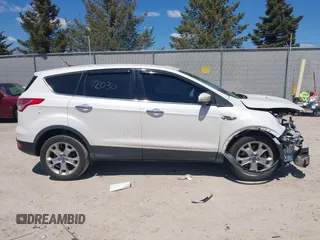 2013 Ford Escape SEL с VIN 1FMCU9H96DUD88466, выставлен на аукционе IAAI как лот 42202030 с пробегом 135 424 миль миль и . История ставок и продаж доступна на DreamBid. Изображение 13.