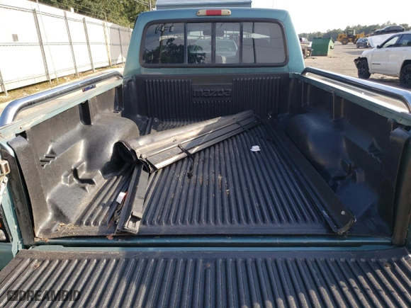1994 Mazda B-Series 2WD Truck SE with VIN 4F4CR12UXRTM96792, listed as a Copart auction lot 73252704 with 135,859 mi miles and Salvage Title. Bid and sale history available at carsss.com. Image 10.