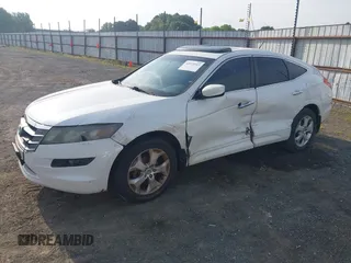 2010 Honda Crosstour EX-L z VIN 5J6TF1H51AL001055, wystawiony jako IAAI lot #42272313 z przebiegiem 228 485 mil mil oraz . Historia ofert i sprzedaży dostępna na DreamBid. Obrazek 2.