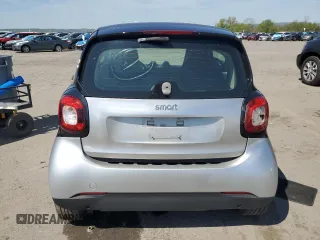 2016 Smart fortwo Passion with VIN WMEFJ5DA2GK069795, listed as a Copart auction lot 55079085 with 153,339 mi miles and Clean Title. Bid and sale history available at DreamBid. Image 6.