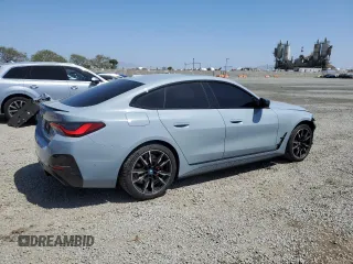 2024 BMW i4 M50 with VIN WBY33AW00RFR75589, listed as a Copart auction lot 54159955 with 8,113 mi miles and Salvage Title. Bid and sale history available at carsss.com. Image 3.