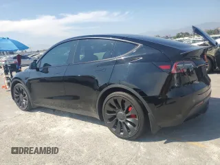 2022 Tesla Model Y Performance with VIN 7SAYGDEF6NF524171, listed as a Copart auction lot 60736945 with 30,629 mi miles and Salvage title. Bid and sale history available at DreamBid. Image 2.