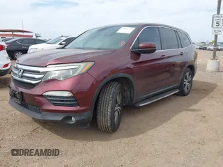 2016 Honda Pilot EX-L with VIN 5FNYF5H57GB028307, listed as a IAAI auction lot 41925711 with 125,118 mi miles and . Bid and sale history available at DreamBid. Image 17.