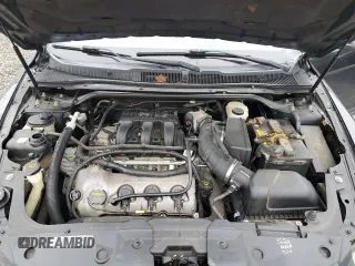 2010 Ford Taurus Limited z VIN 1FAHP2FW6AG108014, wystawiony jako Copart lot #58027455 z przebiegiem 229 871 mil mil oraz Szkoda całkowita • Salvage title. Historia ofert i sprzedaży dostępna na DreamBid. Obrazek 11.