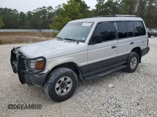 1995 Mitsubishi Montero z VIN JA4MR41H7SJ024208, wystawiony jako Copart lot #42971825 z przebiegiem 313 990 mil mil oraz Szkoda całkowita • Salvage title. Historia ofert i sprzedaży dostępna na DreamBid. Obrazek 1.