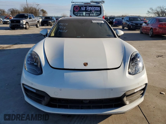2022 Porsche Panamera z VIN WP0AJ2A73NL100639, wystawiony jako Copart lot #81958053 z przebiegiem 3 399 mil mil oraz Czysty tytuł • Clean title. Historia ofert i sprzedaży dostępna na DreamBid. Obrazek 5.