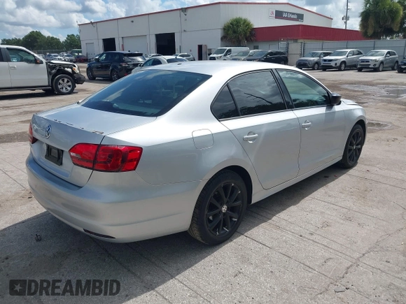 2014 Volkswagen Jetta S with VIN 3VW2K7AJ0EM293919, listed as a IAAI auction lot 42607936 with 189,681 mi miles and . Bid and sale history available at DreamBid. Image 4.