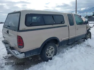 1998 Ford F-150 z VIN 1FTZX18W5WKB97701, wystawiony jako IAAI lot #41254873 z przebiegiem 291 523 mil mil oraz . Historia ofert i sprzedaży dostępna na DreamBid. Obrazek 4.