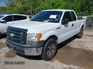 2009 Ford F-150 STX with VIN 1FTRX12W89KC52056, listed as a IAAI auction lot 41982659 with 318,539 mi miles. Bid and sale history available at carsss.com. Image 2.