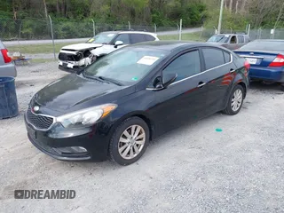 2014 Kia Forte EX with VIN KNAFX4A86E5049938, listed as a IAAI auction lot 42038755 with 82,016 mi miles. Bid and sale history available at carsss.com. Image 2.
