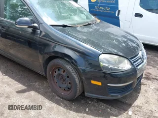 2009 Volkswagen Jetta S with VIN 3VWJZ71K19M053025, listed as a IAAI auction lot 42468951 with 225,036 mi miles and . Bid and sale history available at DreamBid. Image 6.