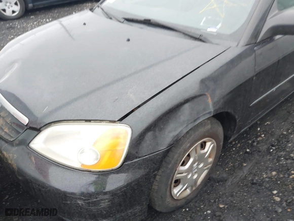2001 Honda Civic LX with VIN 2HGES16511H554283, listed as a IAAI auction lot 41820187 with 999,999 mi miles. Bid and sale history available at carsss.com. Image 6.