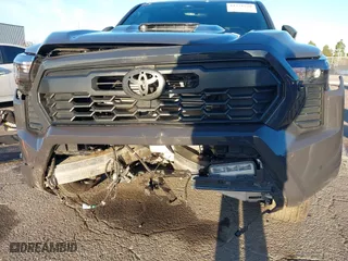 2024 Toyota Tacoma 4WD SR5 with VIN 3TMLB5JN3RM046513, listed as a IAAI auction lot 41231528 with 7,091 mi miles. Bid and sale history available at carsss.com. Image 6.
