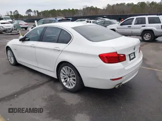 2015 BMW 5 Series 528i with VIN WBA5A5C5XFD516999, listed as a IAAI auction lot 41195184 with 131,187 mi miles. Bid and sale history available at carsss.com. Image 3.